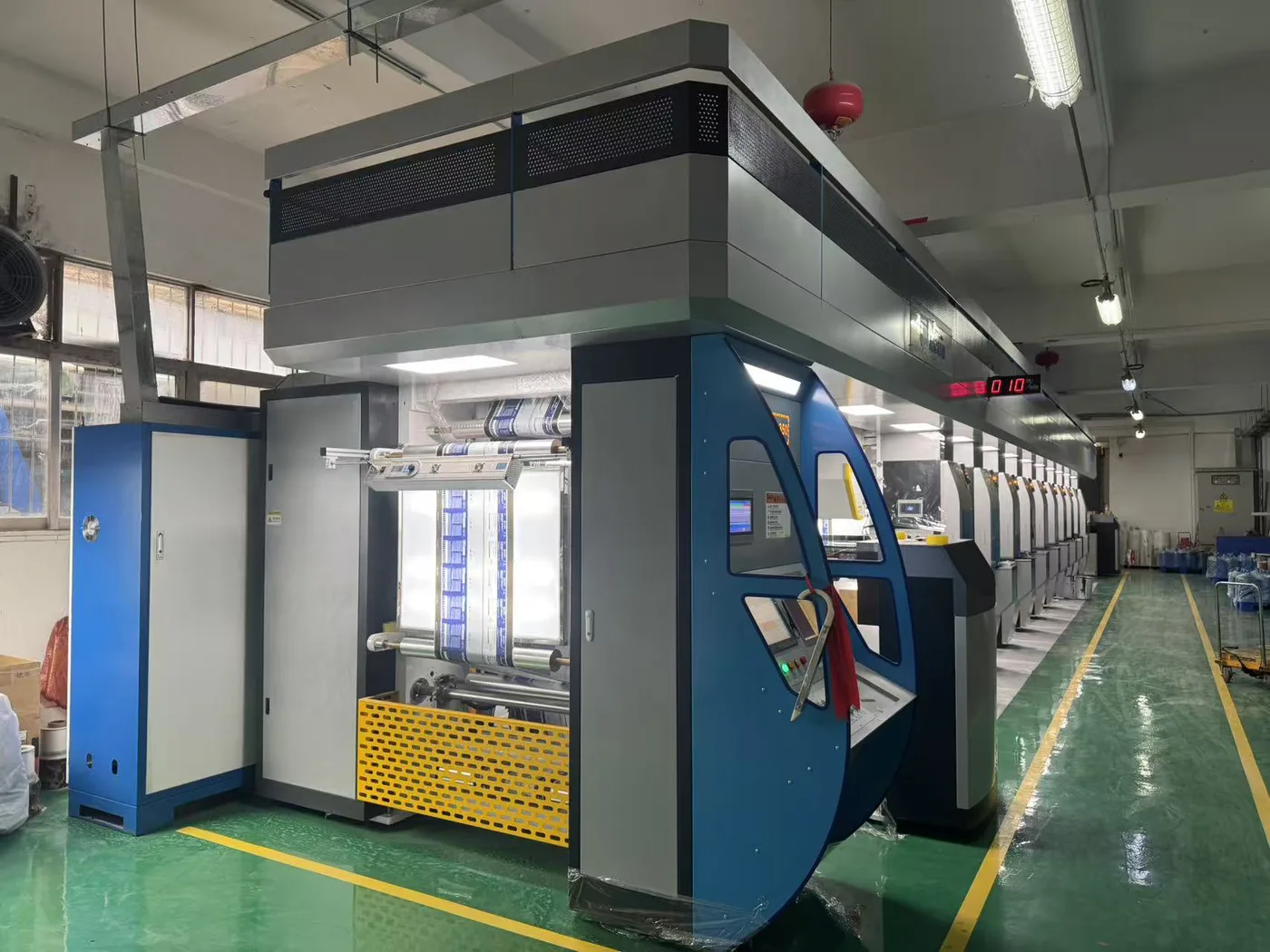 Laminating machine with film rolls